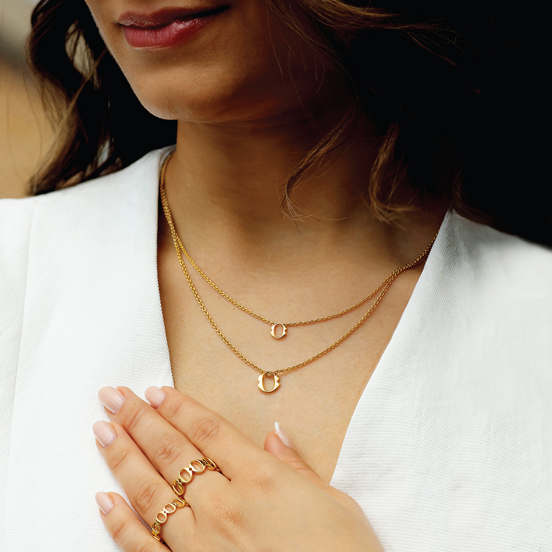 18ct Yellow gold small ‘O’ necklace from the Iconica Collection on the neck