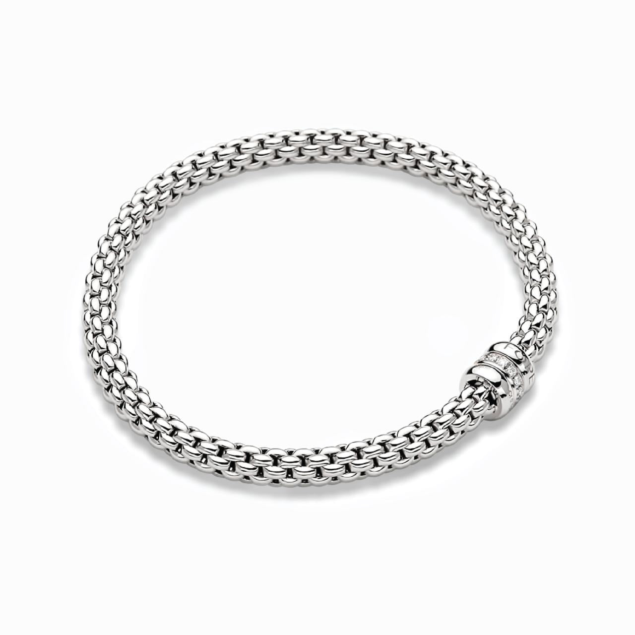 18ct white gold flexible 'FOPE' bracelet with an 18ct white gold 0.10ct diamond set rondel