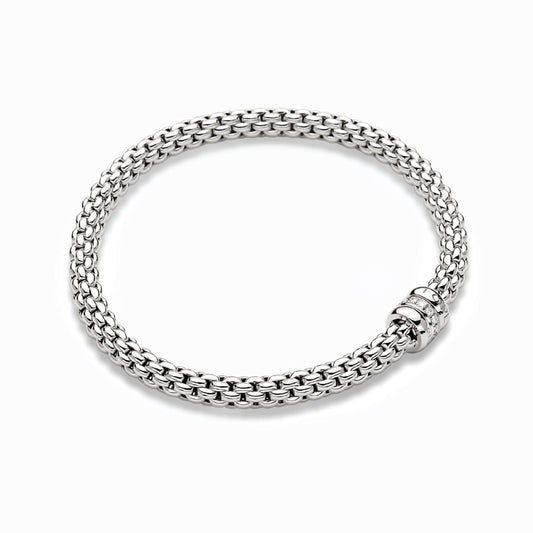 18ct white gold flexible 'FOPE' bracelet with an 18ct white gold 0.10ct diamond set rondel