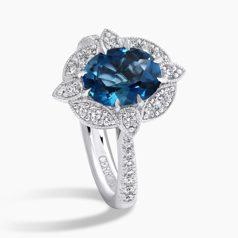 18ct white gold oval London blue topaz and diamond halo ring side view