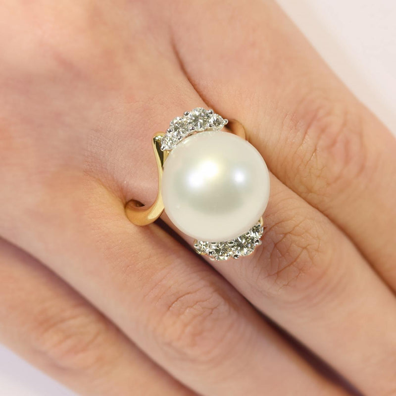 18ct white and yellow gold south sea pearl and diamond ring on the finger