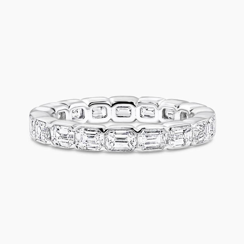 18ct white gold bezel set emerald cut diamond full circle ring
