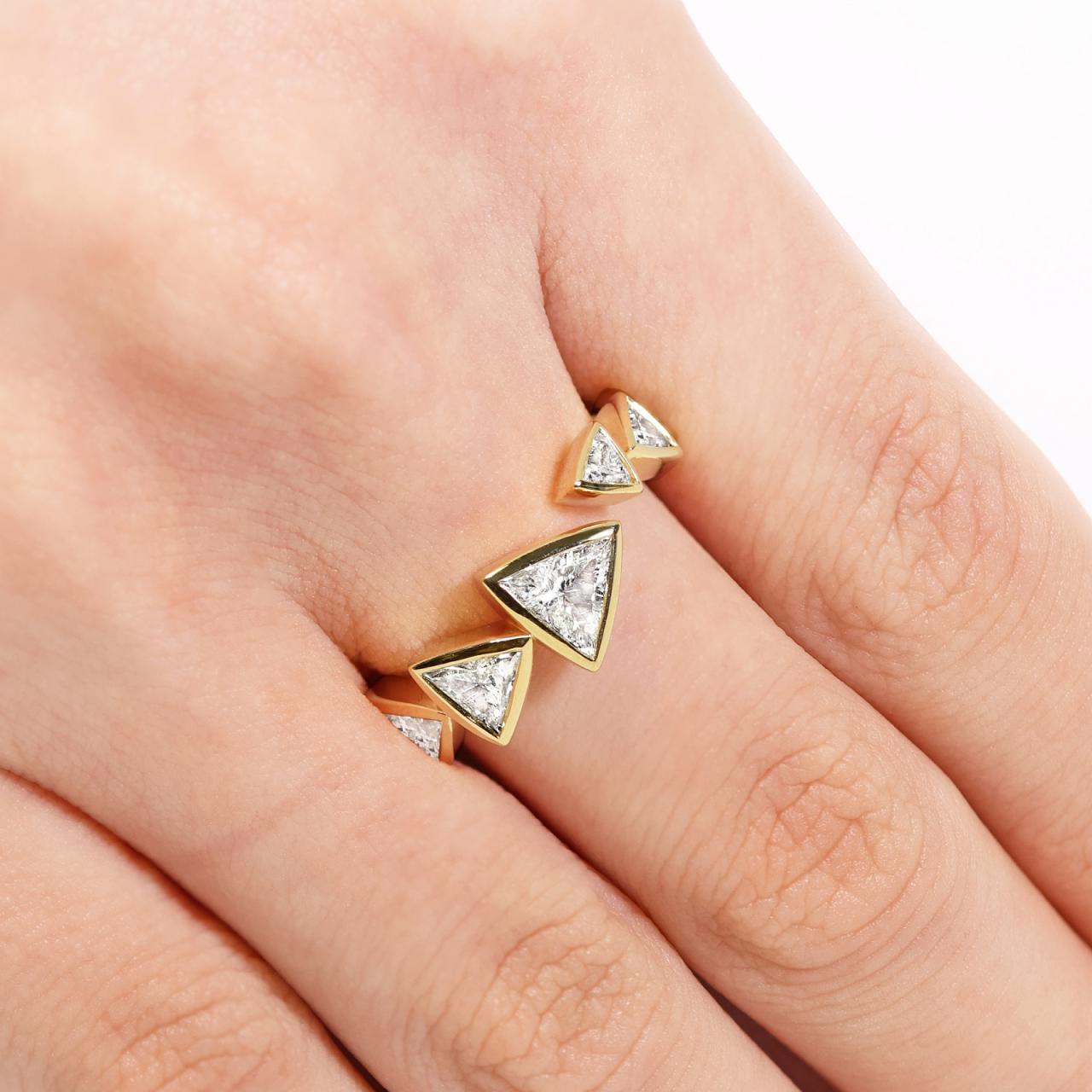 18ct yellow gold trilliant cut diamond bezel set ring