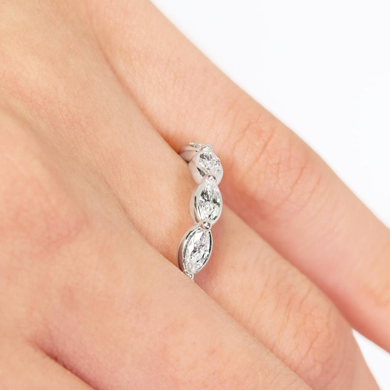 18ct white gold marquise bezel set diamond ring on the finger