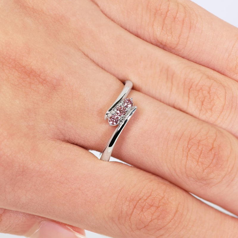 18ct white gold round brilliant cut Argyle pink diamond ring displayed on the finger