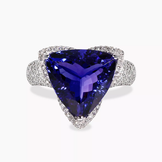 18ct white gold 8.09ct trilliant cut Tanzanite and pave set round brilliant cut diamond ring