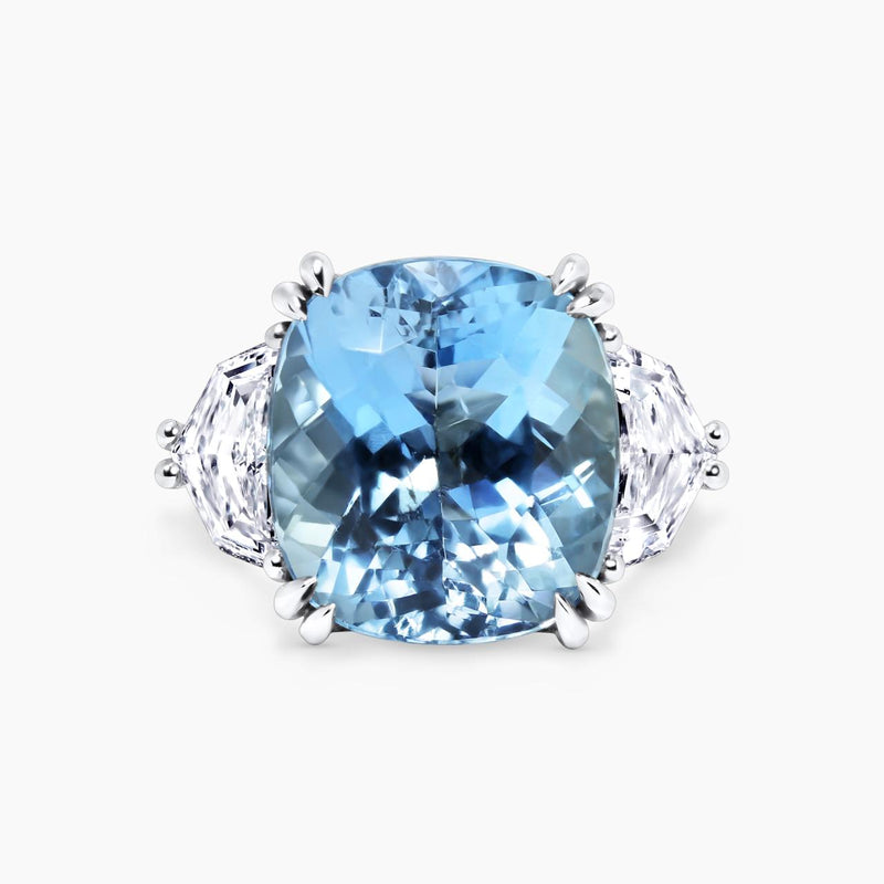 18ct white gold 9.59ct cushion aquamarine and 2=1.54ct epoulette cut diamond ring