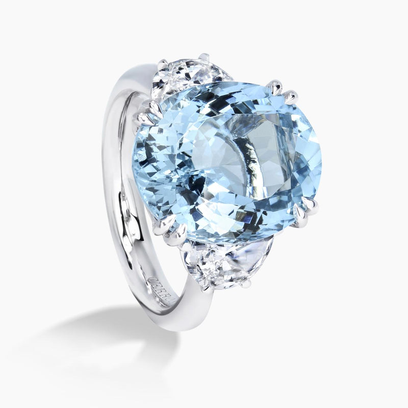 18ct white gold oval aquamarine and half moon brilliant cut diamond ring