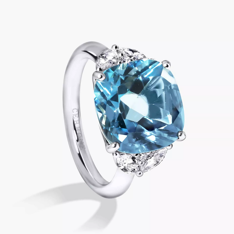 18ct white gold cushion cut Swiss blue topaz, marquise and round brilliant cut diamond ring side profile