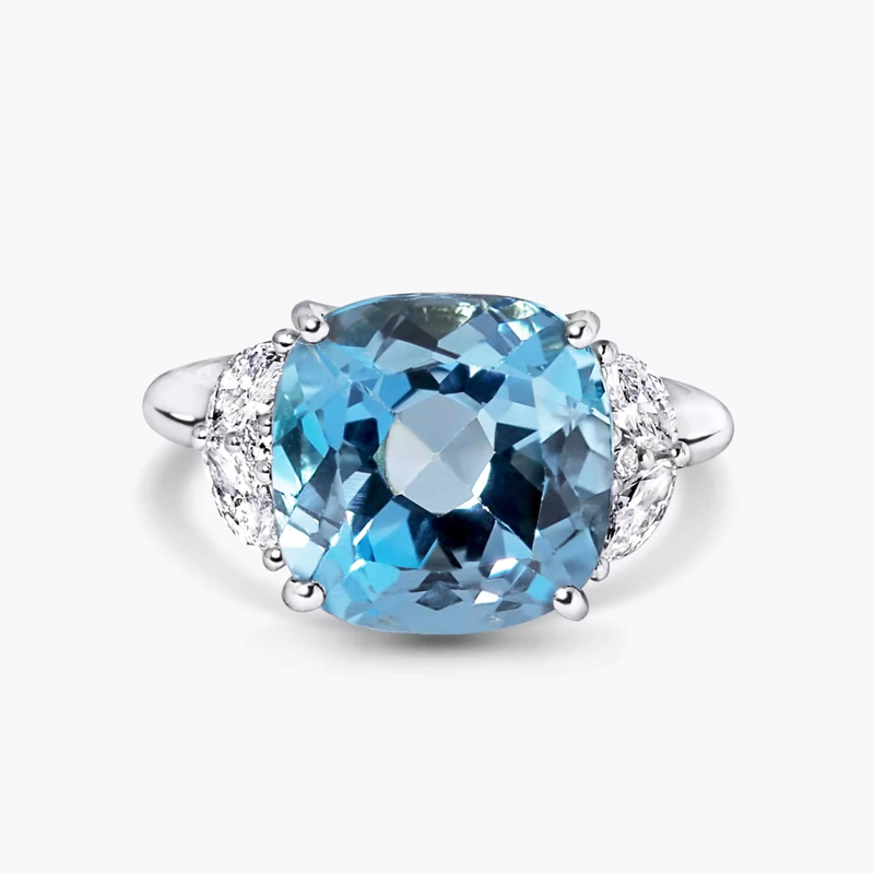18ct white gold cushion cut Swiss blue topaz, marquise and round brilliant cut diamond ring