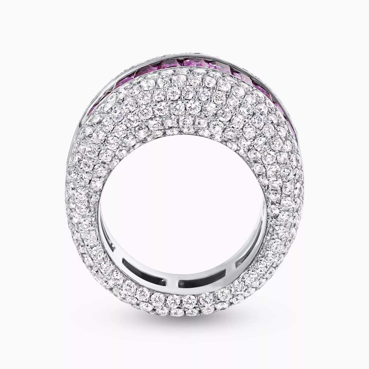 18ct white gold graduated emerald cut pink sapphire and pave set round brilliant cut diamond dress ring