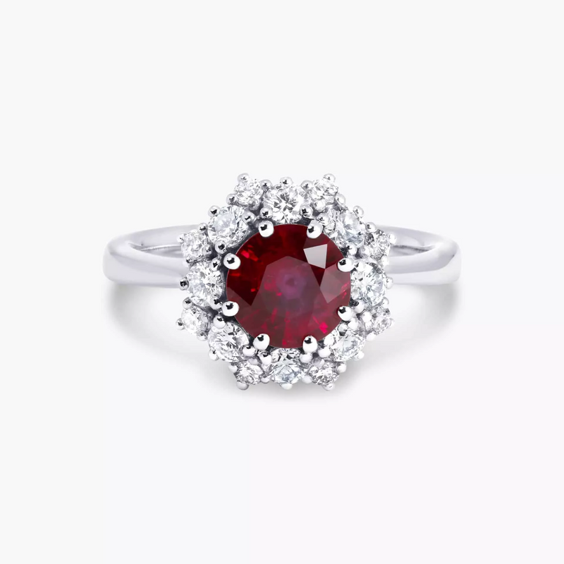 Platinum round brilliant cut ruby and diamond halo ring