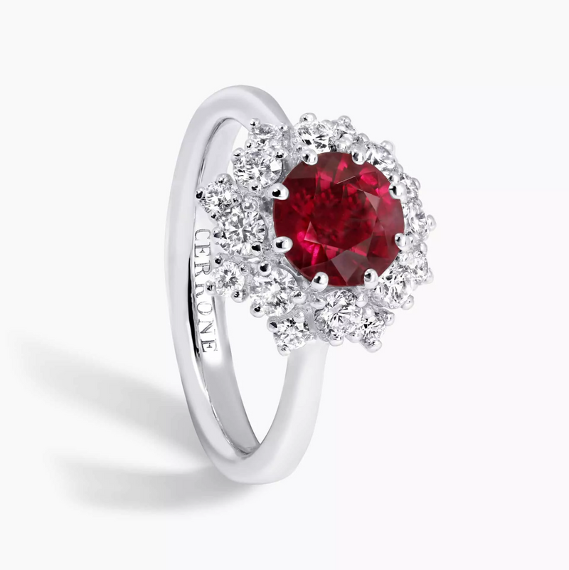 Platinum round brilliant cut ruby and diamond halo ring side view
