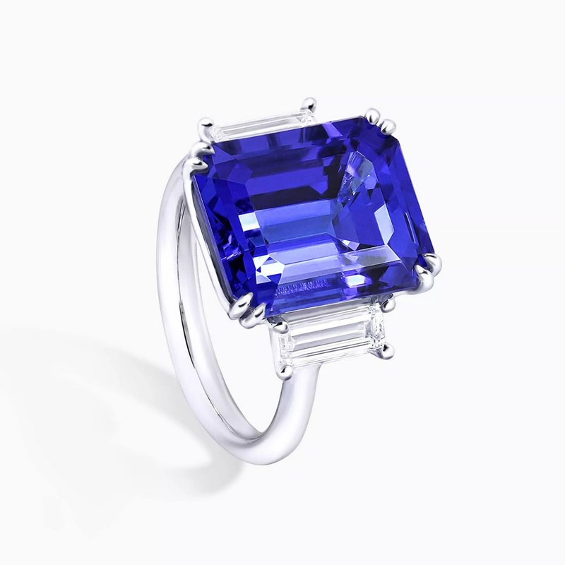 18ct white gold emerald cut Merelani tanzanite and baguette diamond ring side view