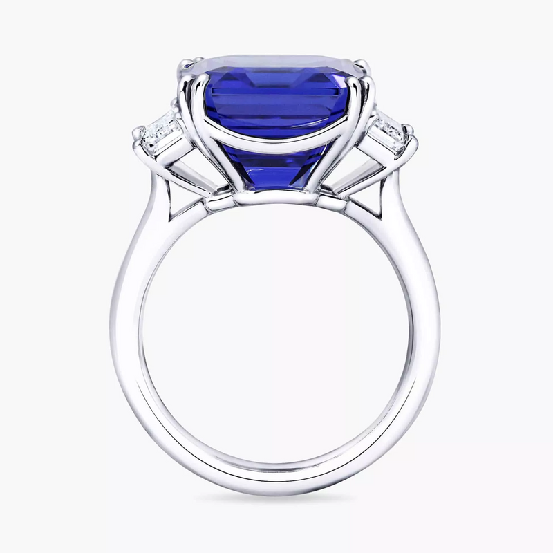 18ct white gold emerald cut Merelani tanzanite and baguette diamond ring side profile