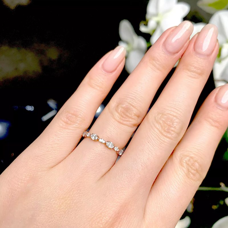 18ct rose gold oval and marquise diamond full circle ring on the finger