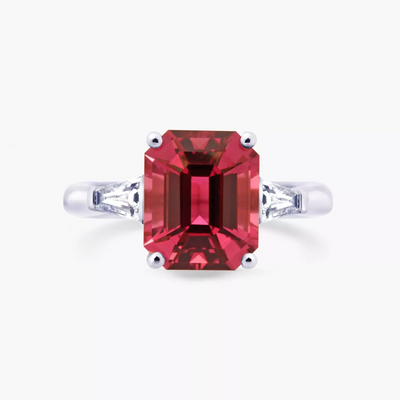 Platinum emerald cut pink tourmaline and tapered baguette diamond ring