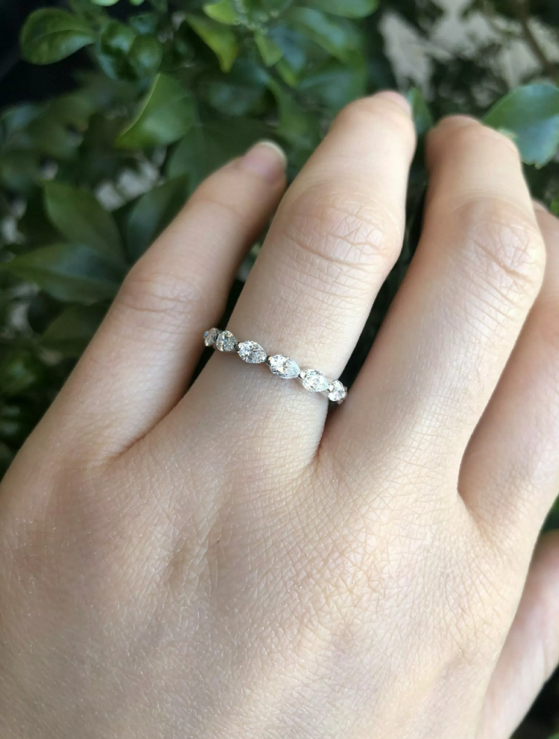 18ct white gold pear shape diamond full circle ring on the finger