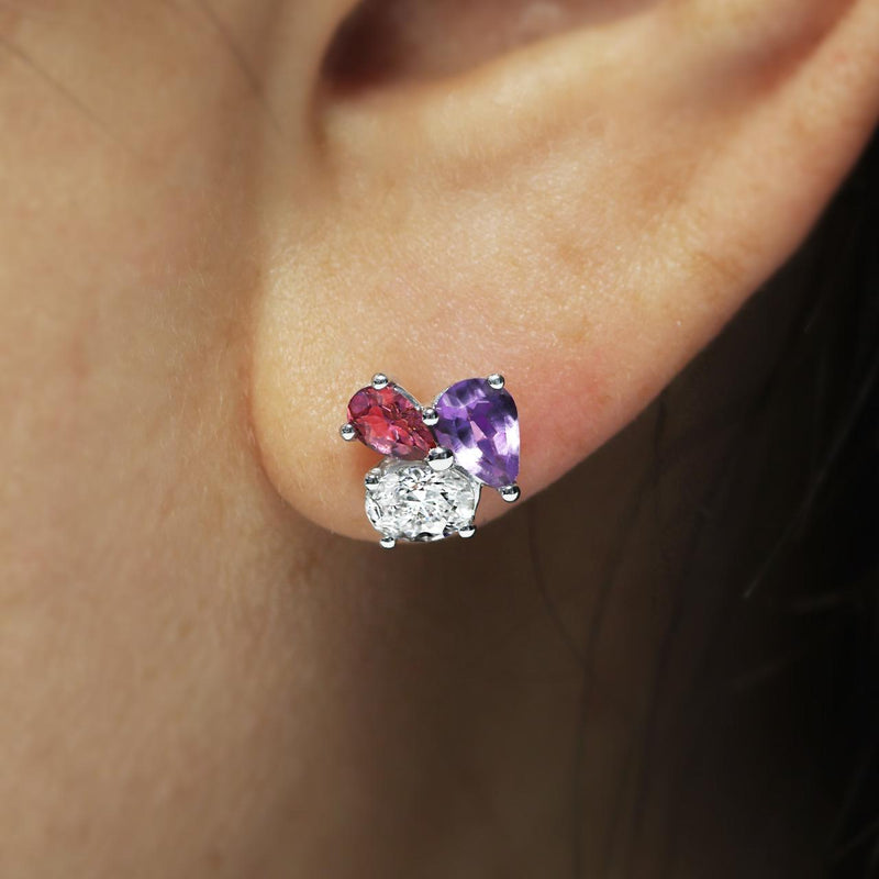 18ct white gold diamond, pink topaz & amethyst stud earrings on the ear
