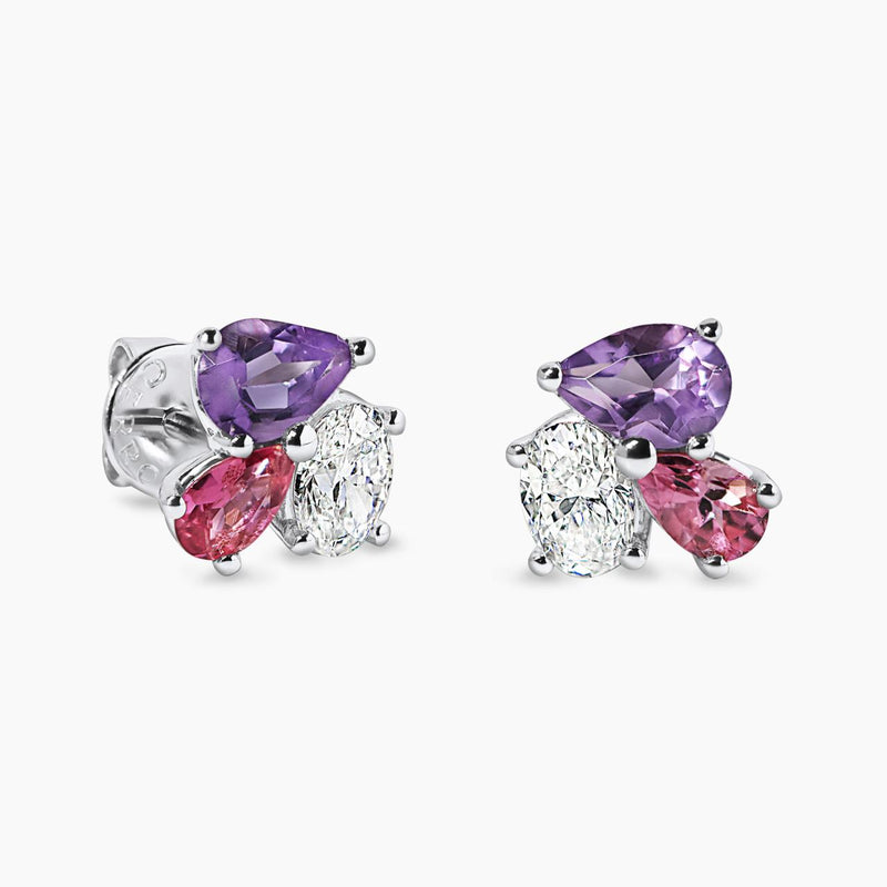 A pair of 18ct white gold stud earrings featuring diamonds, pink topaz, and amethyst in a pear and oval shape design.