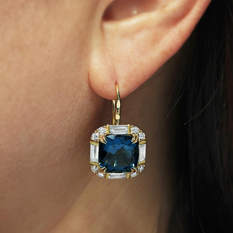 18ct yellow gold cushion cut London blue topaz & diamond drop earrings from the Hampton Collection on the ear