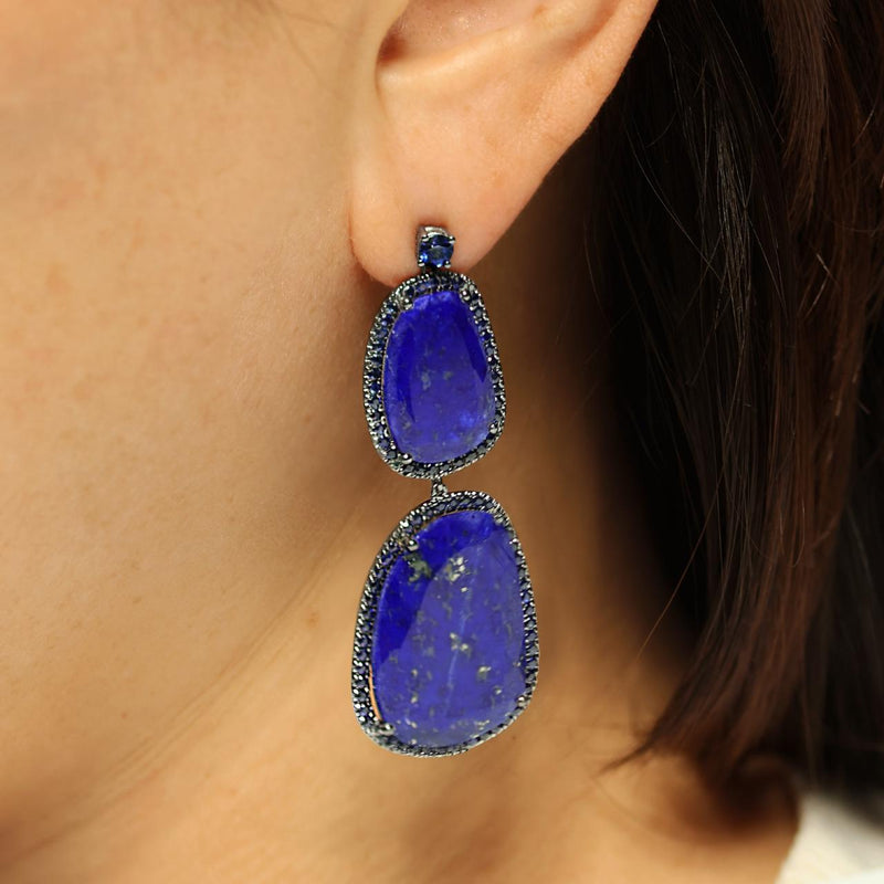 18ct white gold lapis lazuli, blue sapphire & black diamond drop earrings on ear