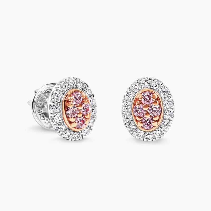A pair of 18ct white and rose gold diamond stud earrings with Argyle Pink and round brilliant cut diamonds.
