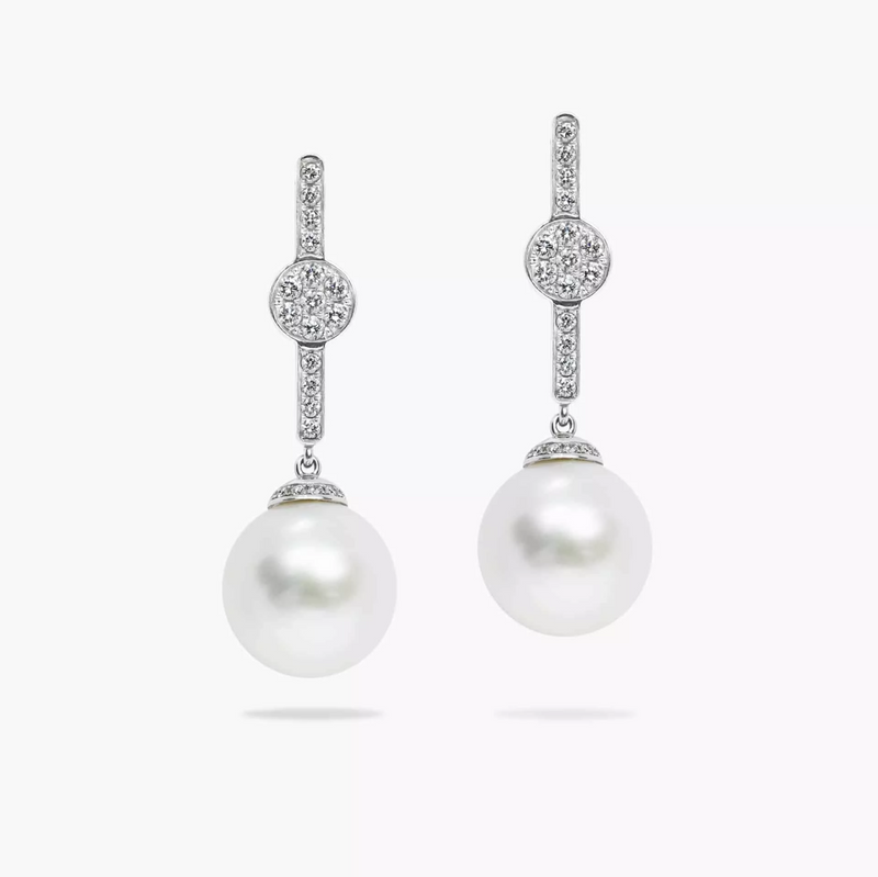 A pair of 18ct white gold drop earrings featuring south sea cultured pearls and diamonds