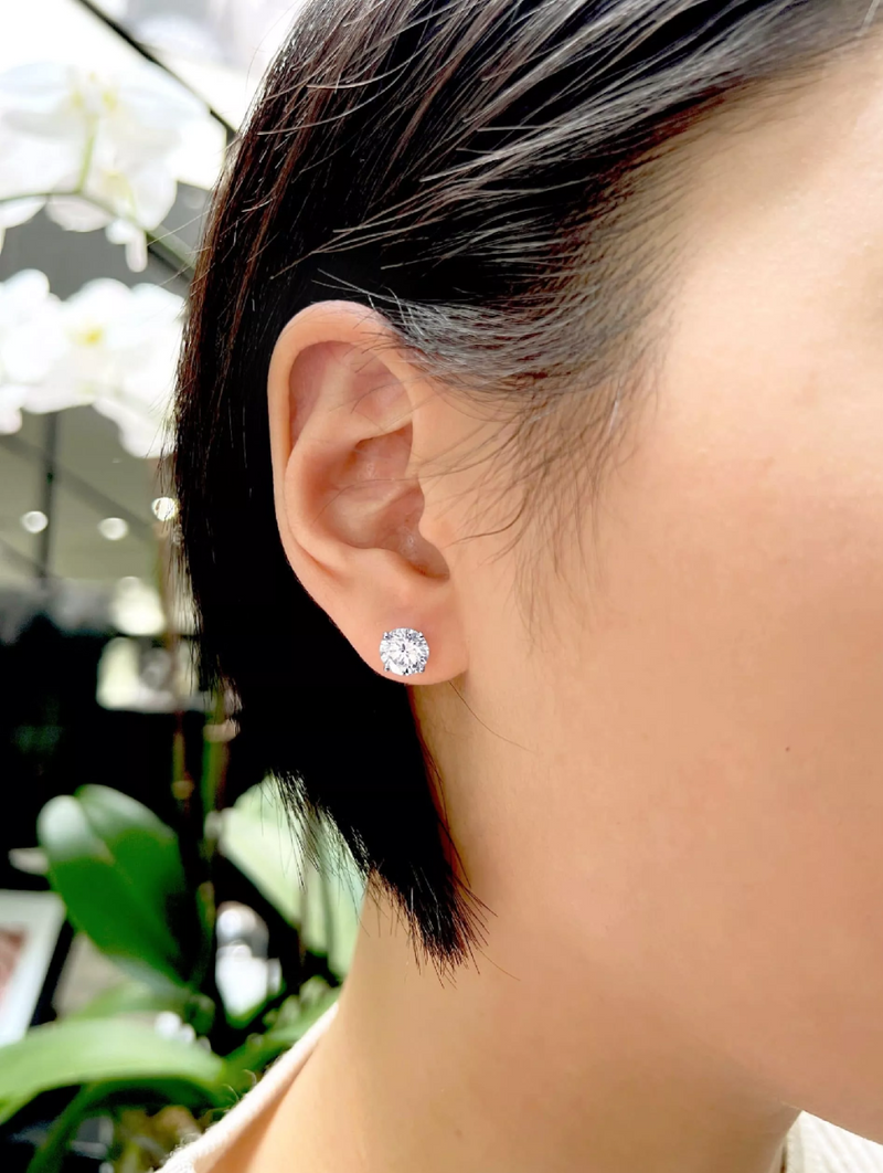 18ct white gold diamond stud earrings on the ear