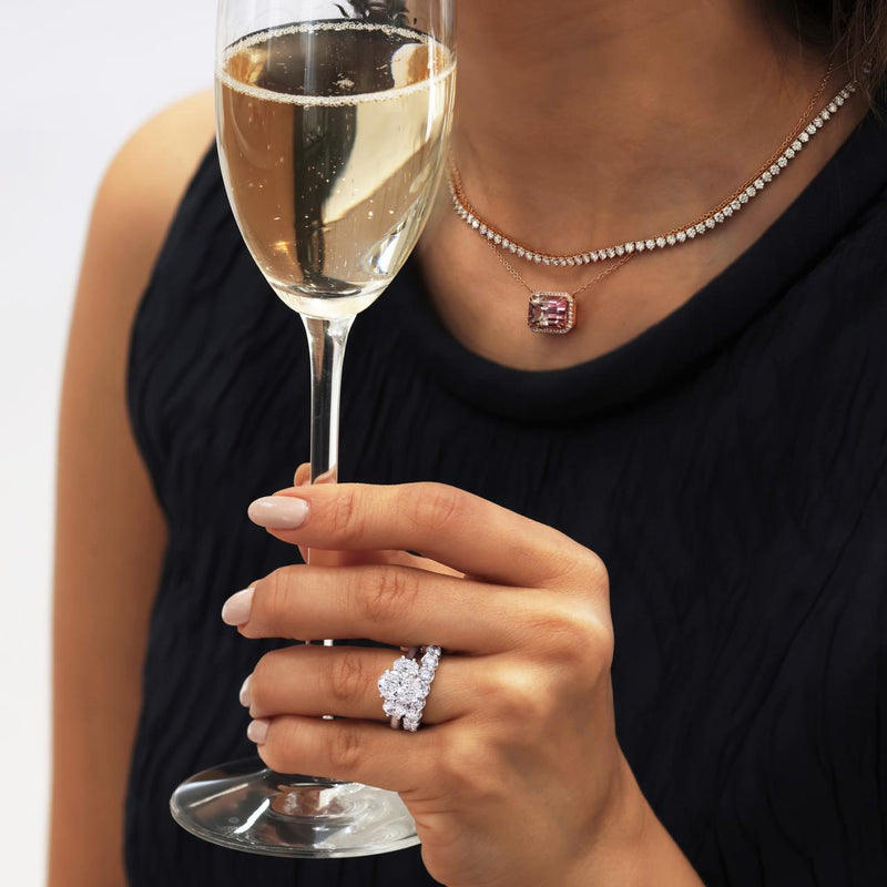 18ct rose gold emerald cut bi coloured tourmaline & diamond necklace on the neck