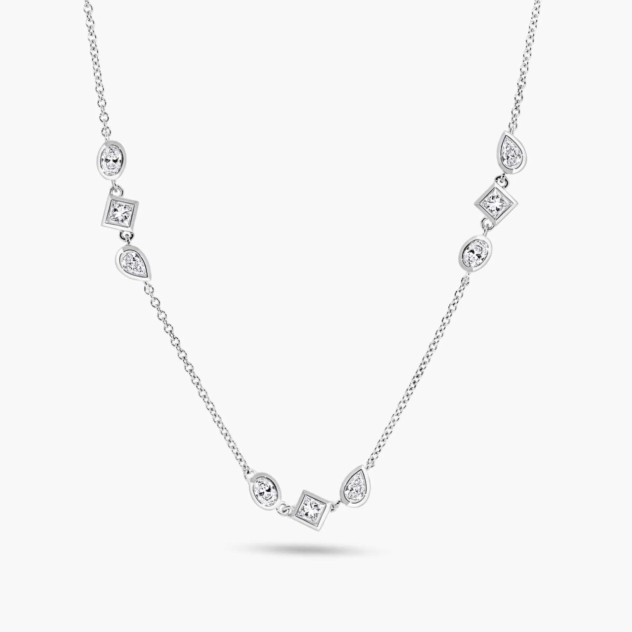 18ct white gold oval, pear, princess cut diamond bezel set necklace