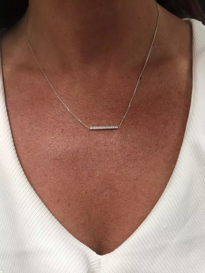 18ct white gold diamond bar necklace on the neck