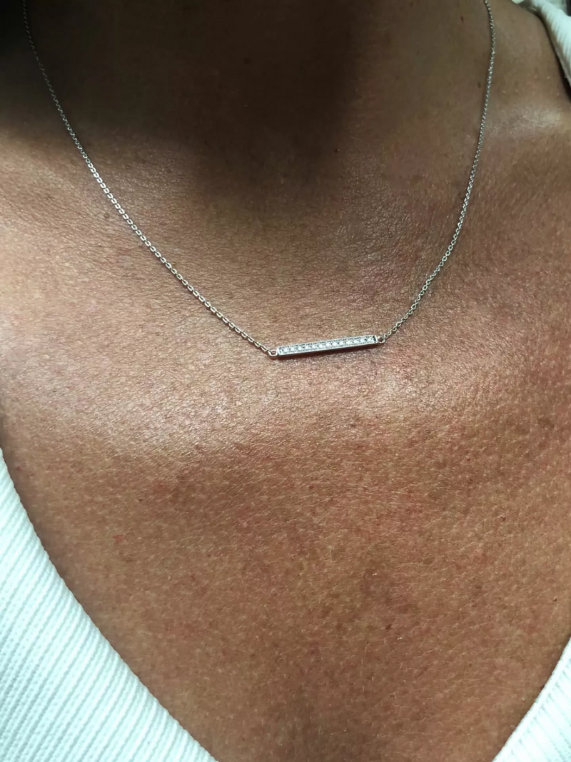 18ct white gold diamond bar necklace on the neck