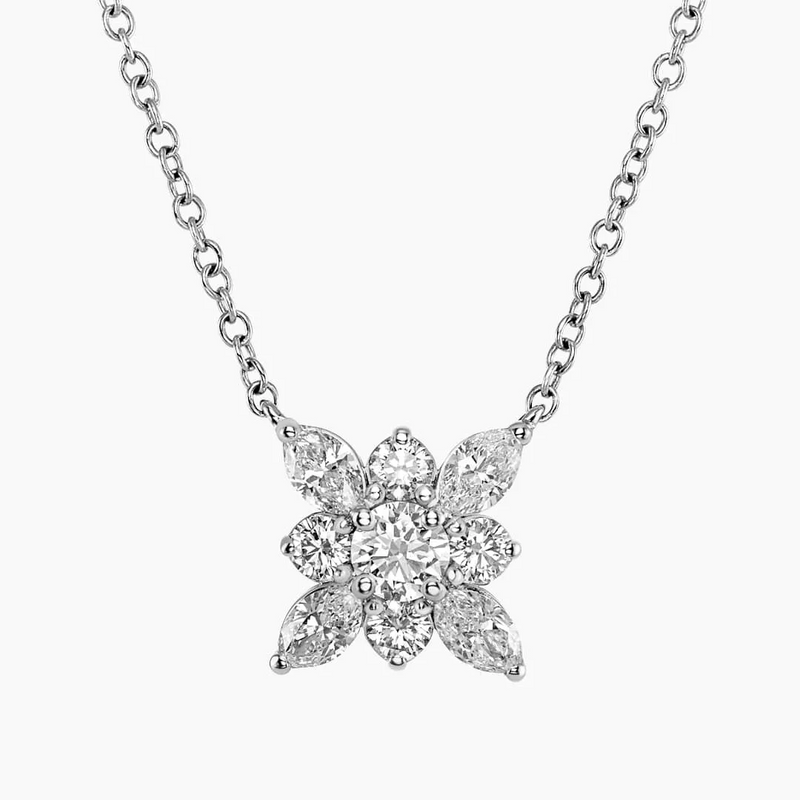An 18ct white gold necklace with a floral design pendant consisting of marquise and round diamonds.