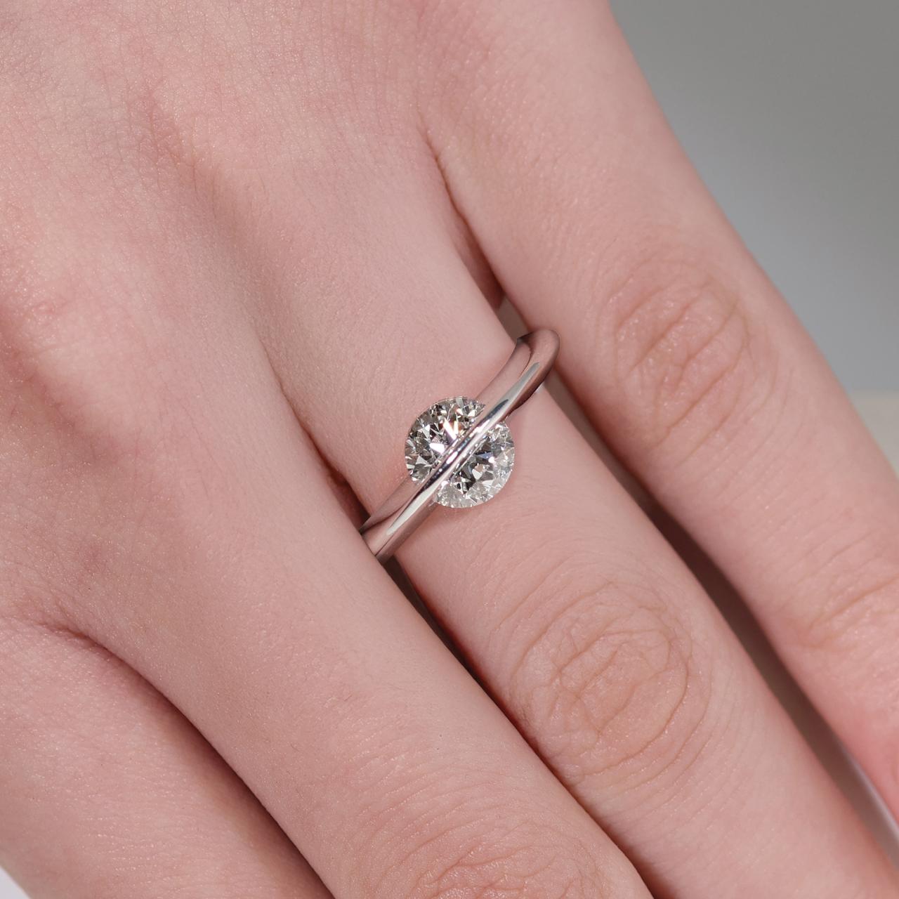 18ct white gold round brilliant cut LAB Grown Diamond ring on finger