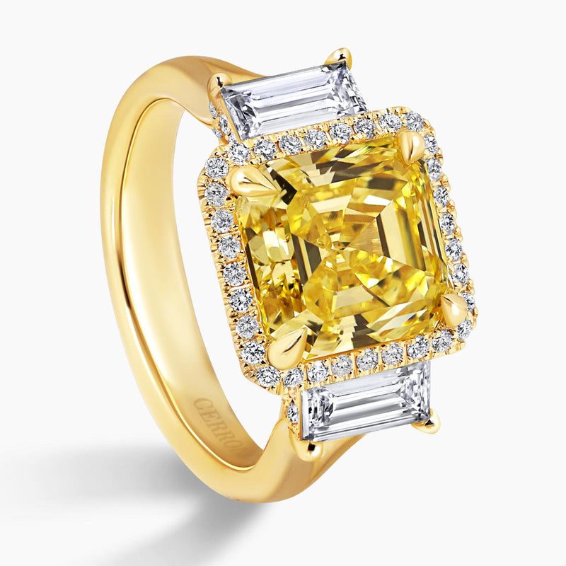 18ct yellow gold Fancy Vivid Yellow asscher cut diamond ring with baguette and round brilliant cut diamonds