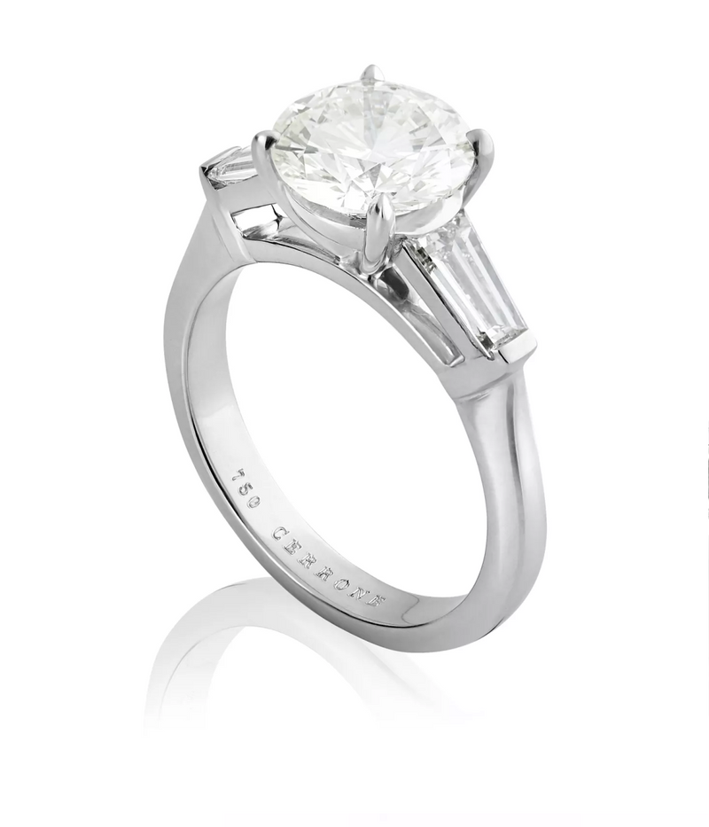 18ct white gold round brilliant and tapered baguette trilogy ring side profile