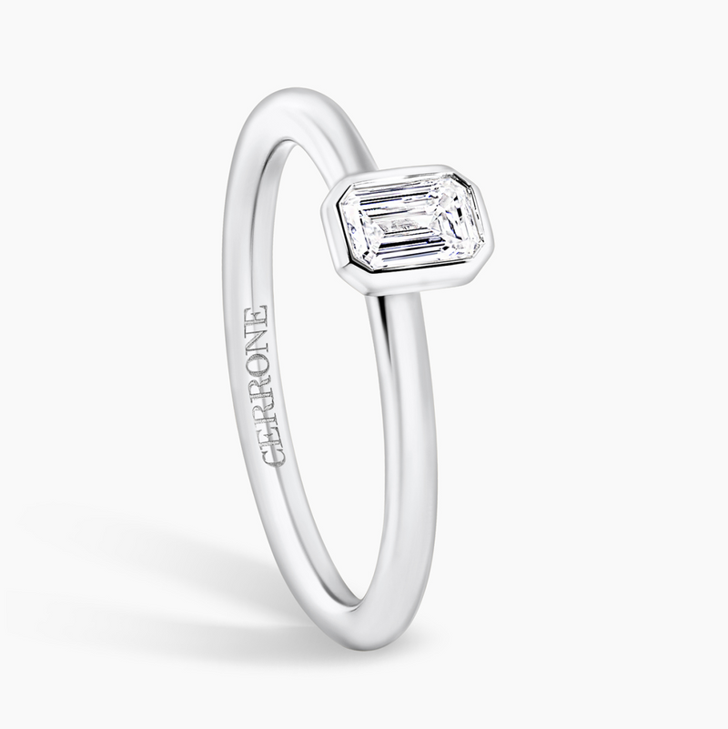 18ct white gold bezel set emerald cut diamond solitaire ring side profile