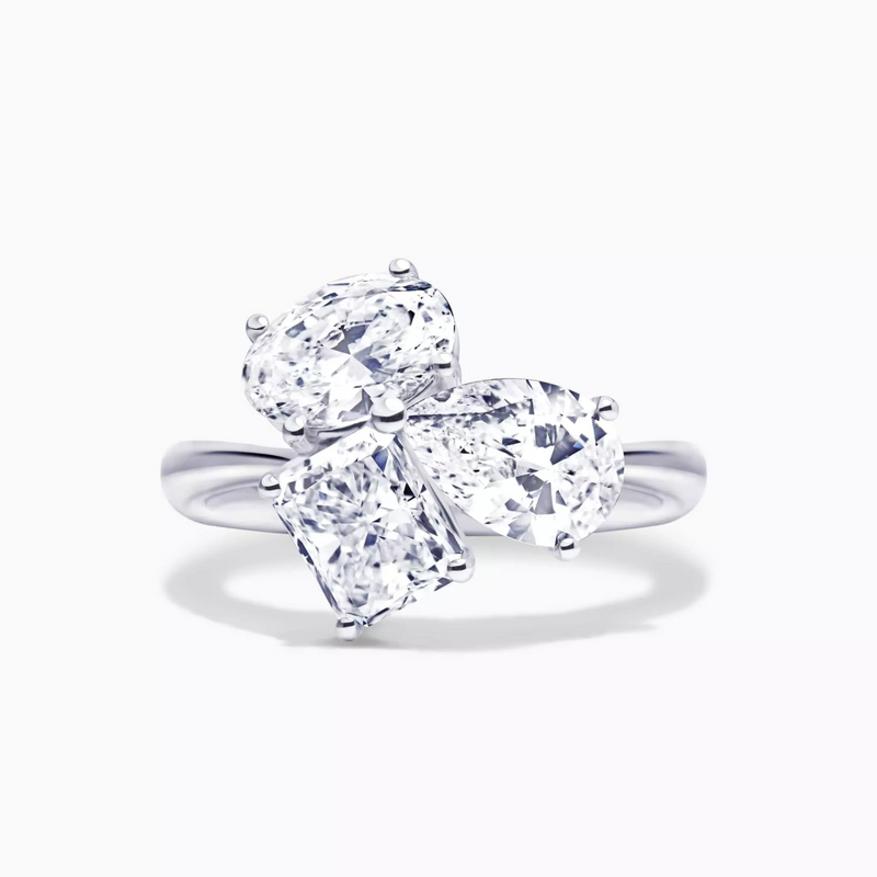 18ct white gold oval, pear, radiant trilogy ring