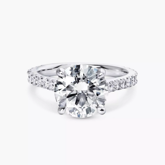 18ct white gold round brilliant cut upswept diamond ring