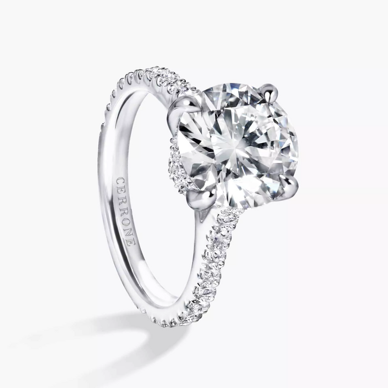 18ct white gold round brilliant cut upswept diamond ring side profile