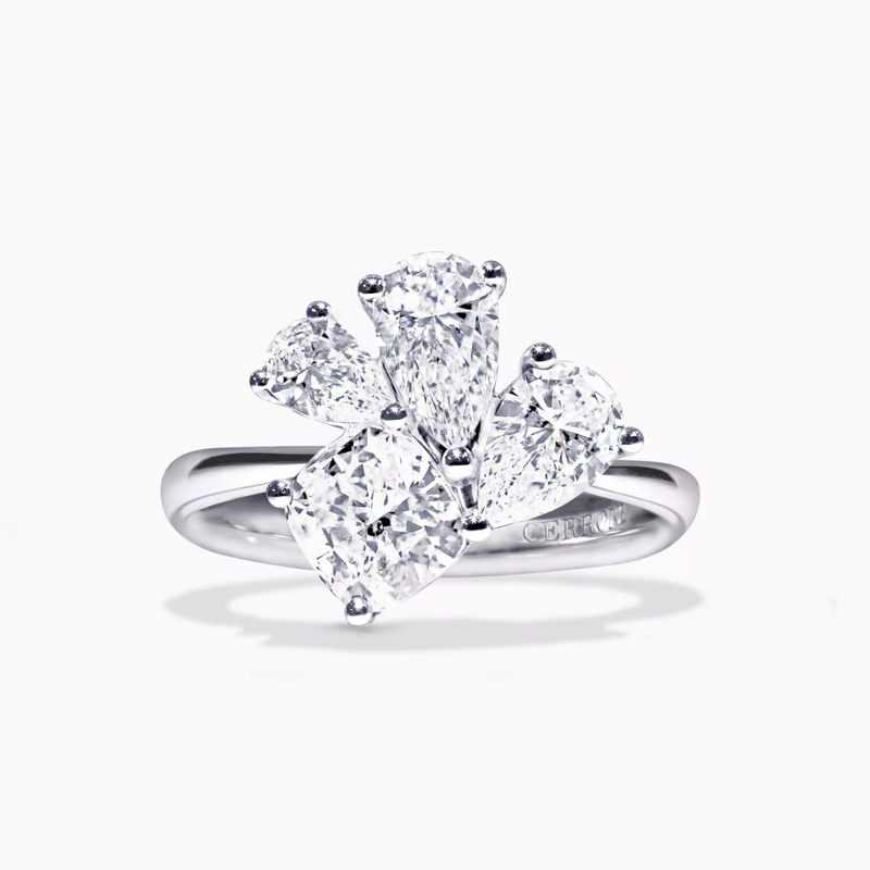 18ct white gold cushion and pear shaped diamond ring