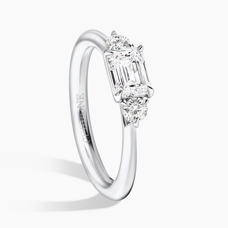 18ct white gold emerald and round brilliant cut diamond engagement ring side view