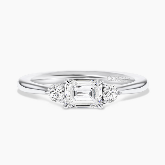 18ct white gold emerald and round brilliant cut diamond ring