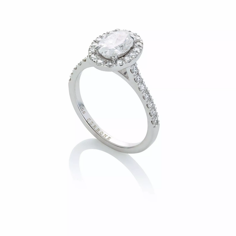 18ct white gold oval and round brilliant cut halo diamond ring side profile