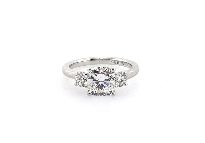 18ct white gold cushion and round brilliant cut trilogy ring