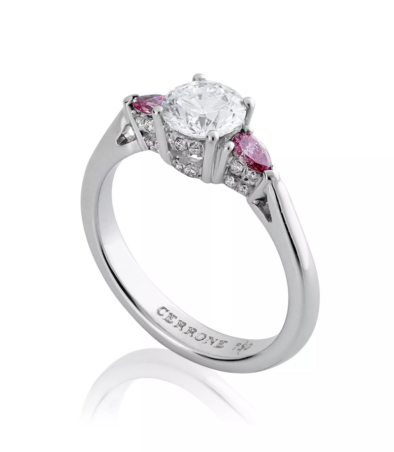 18ct white gold round brilliant cut and Argyle pink diamond trilogy ring side profile