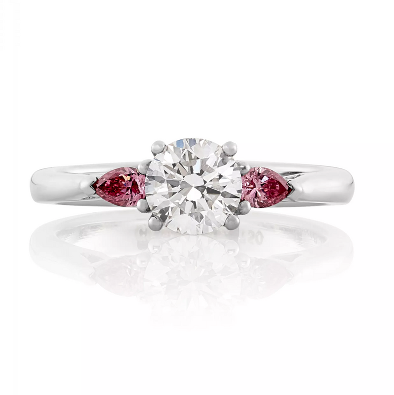 18ct white gold round brilliant cut and Argyle pink diamond trilogy ring