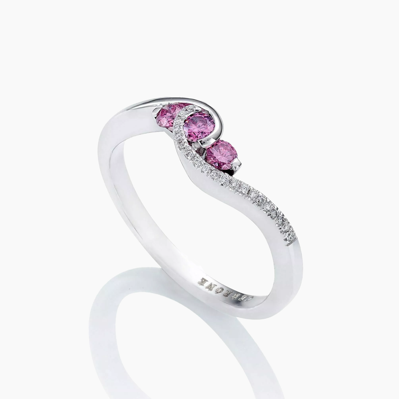 18ct white gold fancy intense pink and white round brilliant cut diamond ring