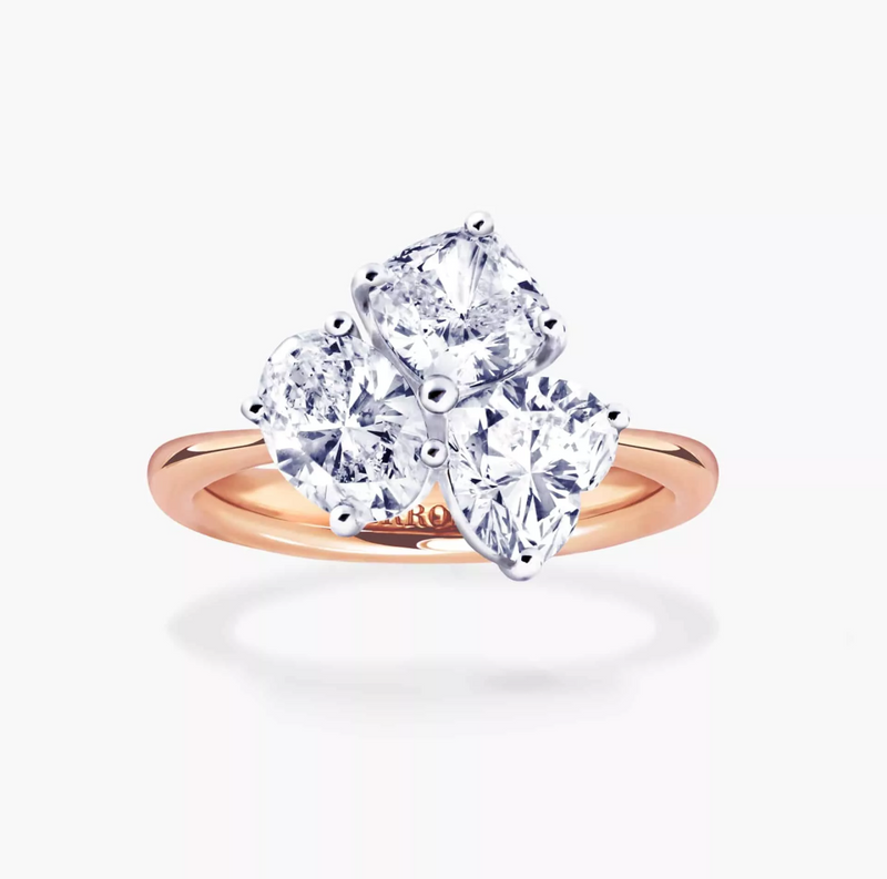 18ct rose and white gold oval, cushion and heart shaped diamond trilogy ring